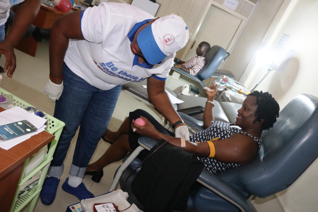 Deputy Health Minister, Hon. Norwu Howard donates blood during 2018 World Blood Donor Day in Liberia
