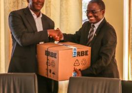 Standing left is WR Malawi Dr Eugene Nyarko handing over cervical cancer equipment and newborn and maternal health commodities at the MOH conference room and Dr Charles Mwansambo received the donation