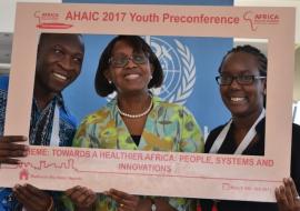 Dr Moeti in a selfie with young people after the town hall engagement at the AHAIC conference