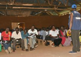 Ms. Nanyonga training the VHTs at Ngenge sub-county in community mobilization 