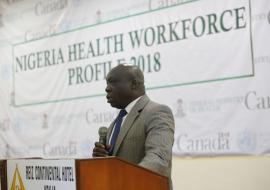 Dr Clement Peter (OiC) making in Speech at the Validation event