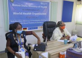 Dr. Inigbehe Oyinloye Babatunde WHO GBV Consultant and Hajiya Falmata of Borno State during sensitization meeting on GBV in Borno State 
