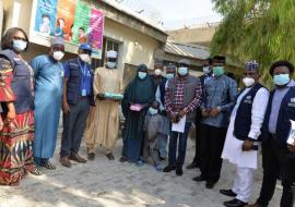 UN RC (4th right), WR (3rd left), UN & WHO personnel presented gifts to last polio case and parents in Maiduguri-Photo credit_WHO Ogbeide.jpg