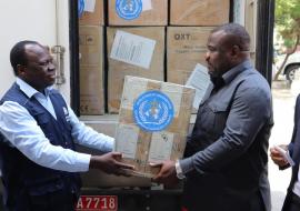 Acting WHO Country Representative, Dr. Zabulon Yoti handing over the oxygen concentrators to the Deputy Minister of Health, Community Development, Gender and Children of Zanzibar