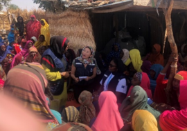 WHO personnel engaging with members of a community in Yobe state.