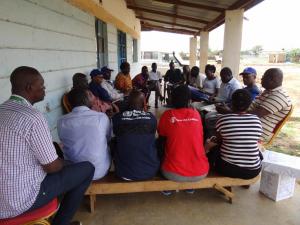 The WHO rapid response team training frontline health workers on malaria diagnosis and treatment. Photo WHO.