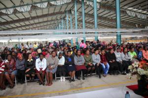Over 300 textile workers listening to presentations during the World Mental Health Day commemoration at the factory.