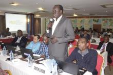 Dr Anthony Laku of South Sudan speaks during a session