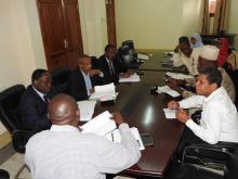 Dr. Kamwa receiving a briefing from Ministry of Health Staff on impelementation of the International Health Regulations