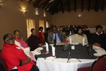 Health officials from the regions listening to presentations during the meeting