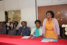 Dr Khosi Mthethwa from WHO addressing the workers while the Minister of Health Honourable Sibongile Ndlela-Simelane, Lugongolweni Member of Parliament Honourable Joseph Souza and Kang-Fa Knitwear Manager Ms Lisa Teng look on.