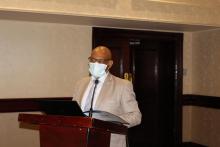 Mr S Kolane (Community Health Services Advisor - MoHW) delivering opening remarks