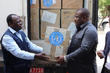 Acting WHO Country Representative, Dr. Zabulon handing over the oxygen concentrators to the Deputy Minister of Health, Community Development, Gender and Children of Zanzibar