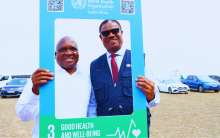Honorable Minister Dr. Joe Phaahla and Dr Kaluwa posing for a photo in support of SDG3 at the WMHD event.