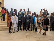 Altos representantes da OMS, do Ministério da Saúde e especialistas se reúnem para uma foto de grupo após a inauguração do JEE