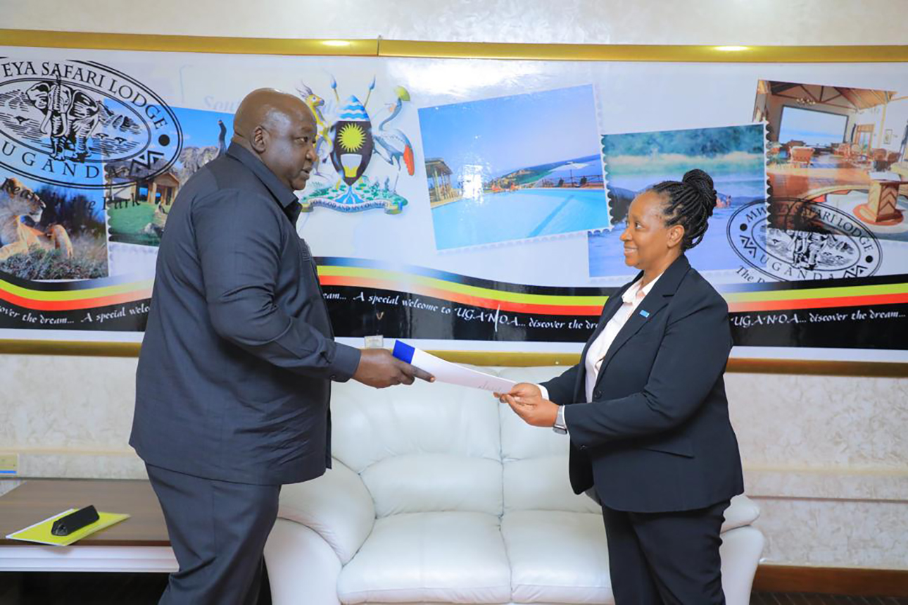 Dr Kasonde Mwinga, the newly appointed WHO Country Representative to Uganda, presenting her credentials to the Minister of State for Foreign Affairs, Hon. Henry Oryem Okello