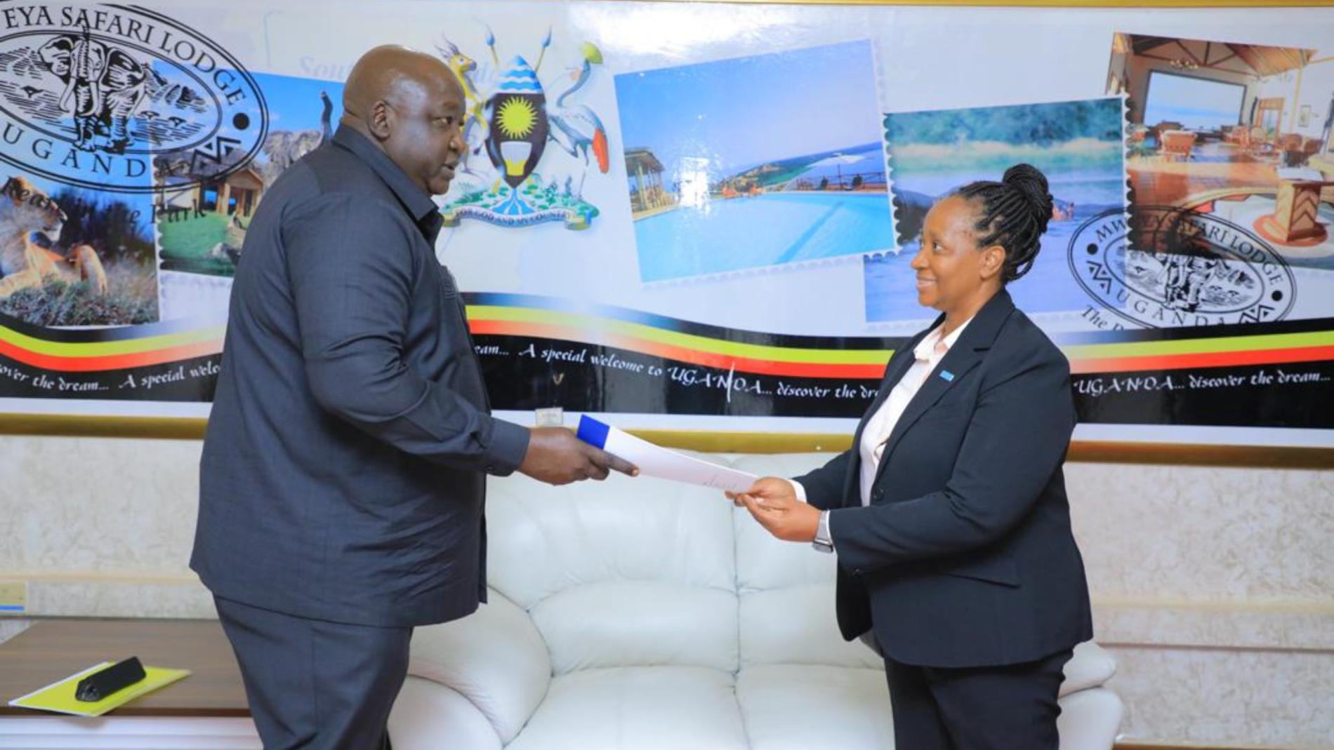 Dr Kasonde Mwinga, the newly appointed WHO Country Representative to Uganda, presenting her credentials to the Minister of State for Foreign Affairs, Hon. Henry Oryem Okello