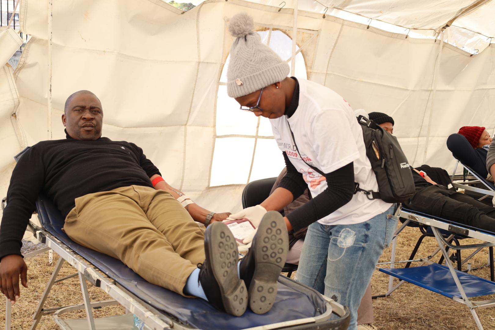 Lesothos Honorable Minister of Health, Mr. Selibe Mochoboroane leads by example by donating blood during the national World Blood Donor day commemoration