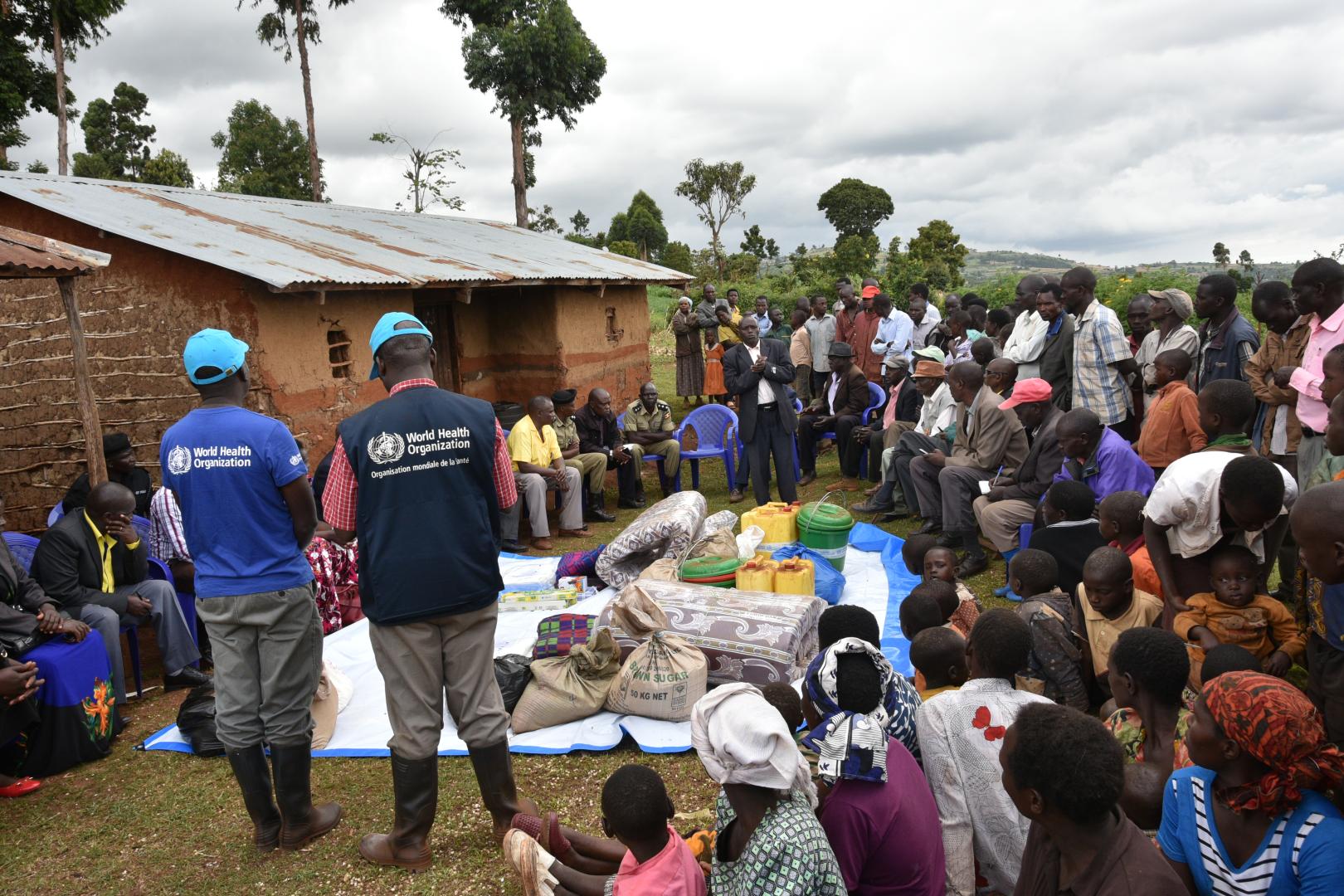 WHO Staff members conducting a community engagement activity during the Marburg Virus Disease outbreak
