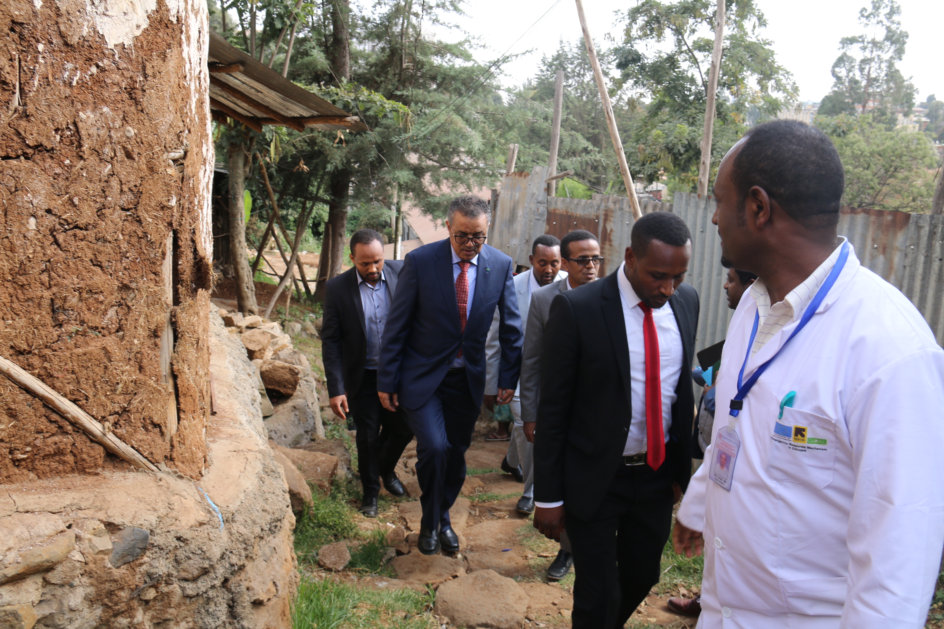 Dr tedros aftervisiting a patient who is benefited from familiy health team