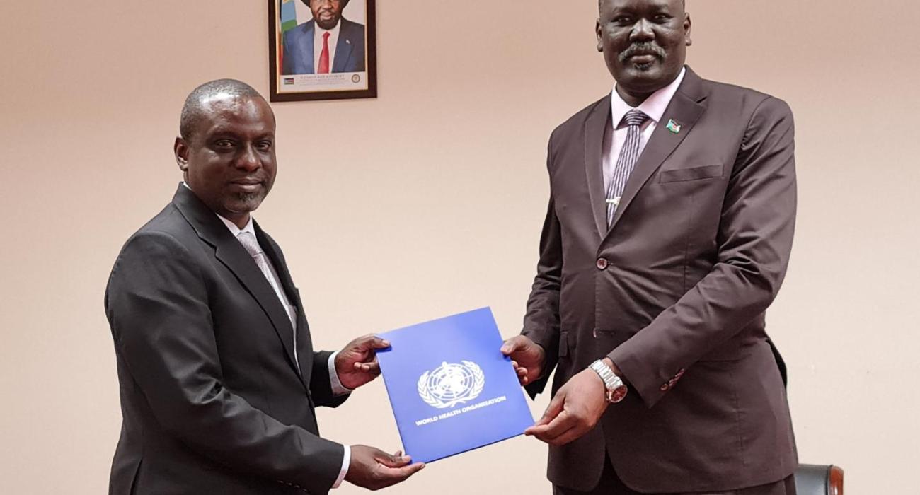 Dr Humphrey Karamagi, presents his letter of credentials to Honorable Ramadan Mohamed Abdallah Goc, Minister of Foreign Affairs and International Corporation, South Sudan