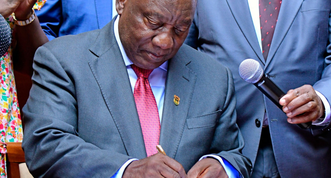 His Excellency President of the Republic of South Africa signing the NHI Bill into law