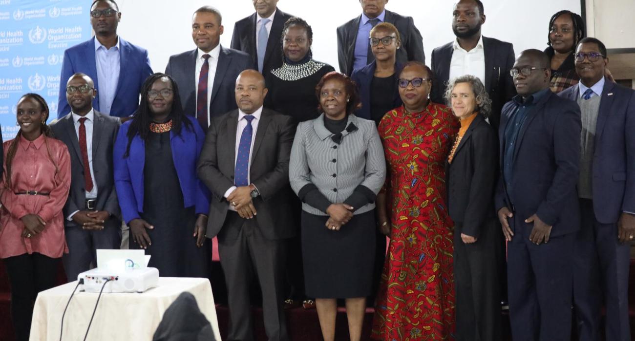 Minister of Health Honorable Mduduzi Matsebula and the WHO Representative Dr Susan Tembo posing with the team of external experts during the official opening of the JEE   