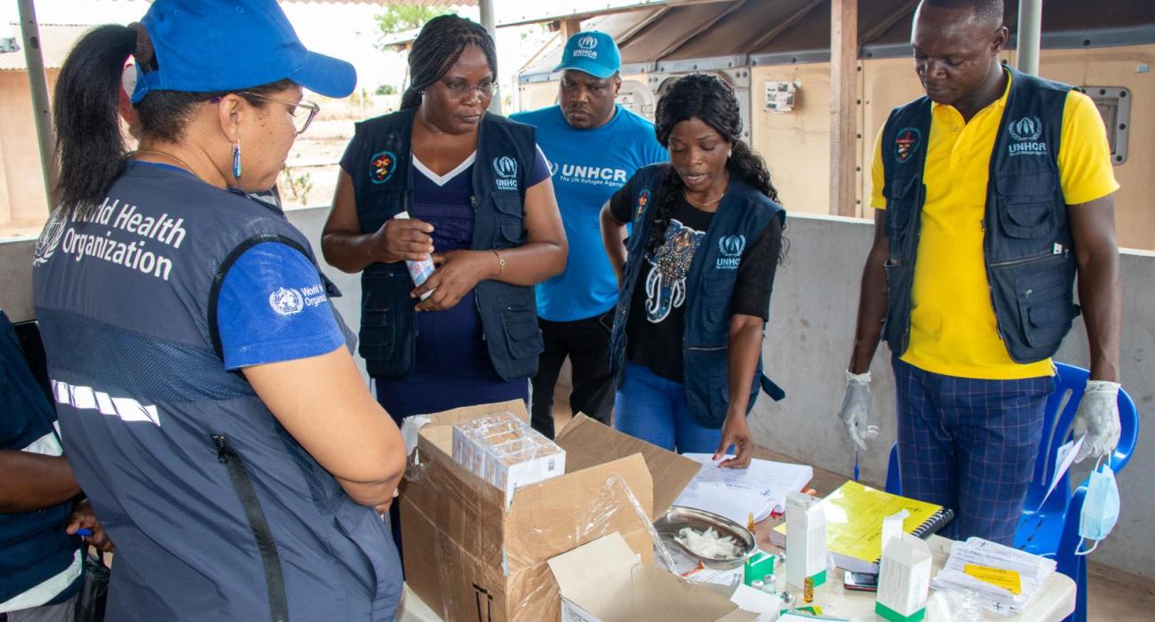 WHO, UNHCR and IEIA assessing the health clinic in Lovua Refugee Settlement