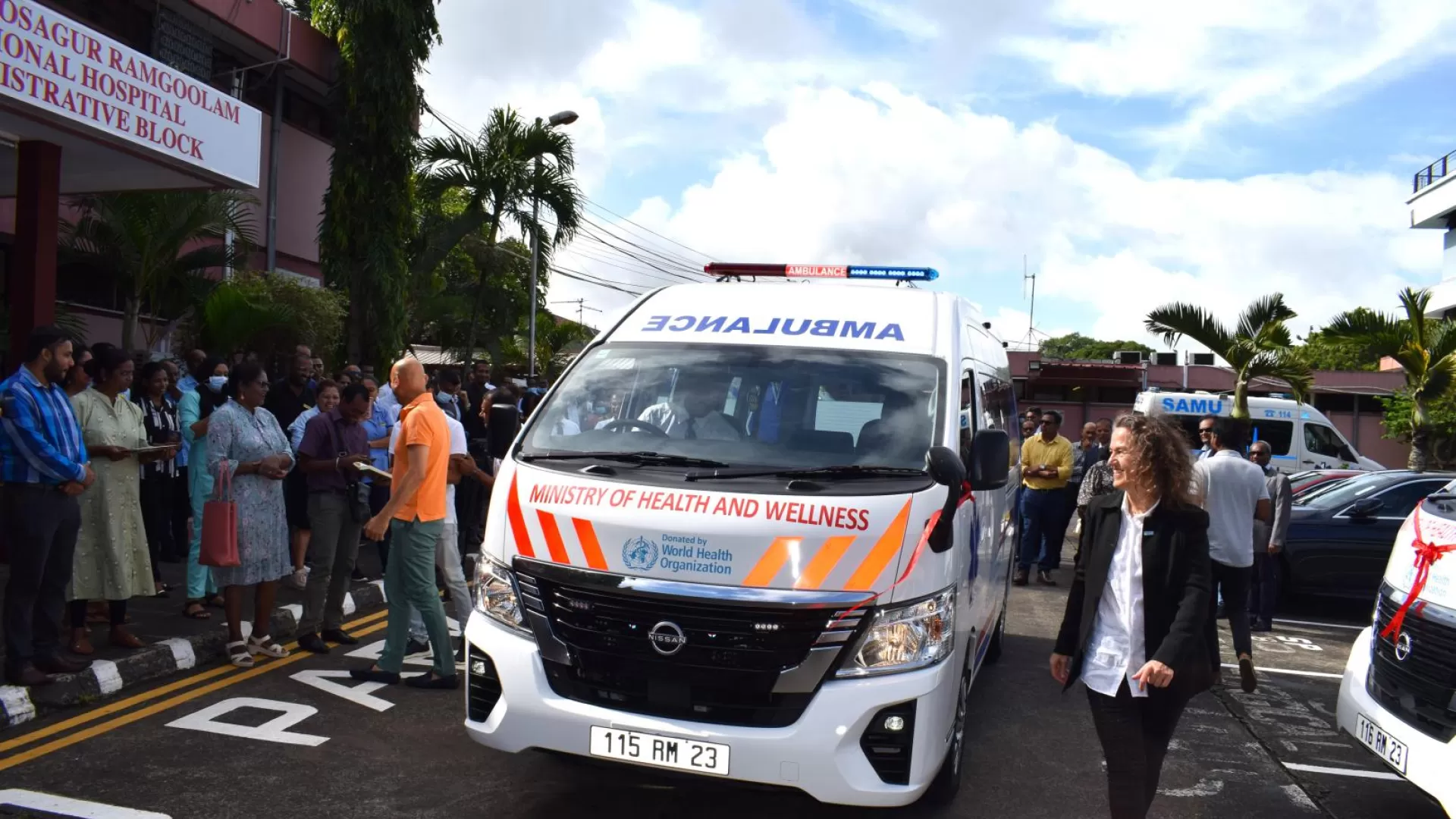 The minister of Health and Wellness, Dr Jagatpal, and WR, Dr Ancia, inspect one of the new vehicles.