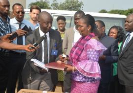 WHO Country Rep Liberia handing over transfer certificates and keys to the Minister of Health 