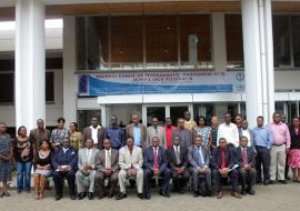 The Permanent Secretary Mr. Mark Bor CBS 6th from left poses for a photograph with the Director of KEMRI Dr S. Mpoke 5th from left, WHO OIC Dr R. Mpazanje, facilitators