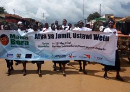 Health workers and members of the community commemorate AVW & Malezi Bora celebrations in West Pokot County, Kenya, recently