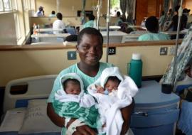 Happy ending: A proud mother of twins after delivering in a health facility with skilled birth attendants