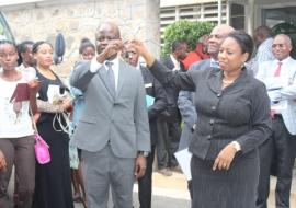 Dr. Richard Banda, OIC-WHO Tanzania handing over keys to the Minister for Health, Hon. Ummy Mwalimu
