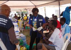 WHO team providing malaria testing and treatment services