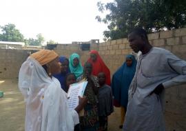 Community Health Champion educating household members on the common household diseases and preventive measures. Photo  WHO NOA, Borno state.