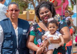 Orisa Brito with her baby Lila and the WHO Cabo Verde DPC, Carolina Leite