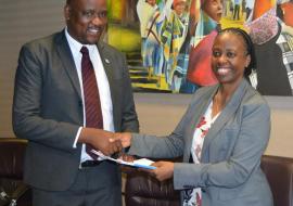 Dr Josephine Namboze, WHO Representative (right) presenting her credentials to the Minister of Health and Wellness, Honourable Dr Alfred Madigele