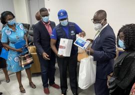 Dr Kasolo handing over items to the Chief Director of the Ministry of Health, Mr Kwabena Boadu Oku-Afari 