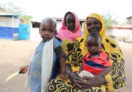 Nyatuka Othow and her children received oral cholera vaccine 