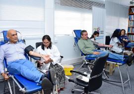 The Honorable Minister of Health and Wellness, Dr Kailesh Kumar Singh Jagutpal;His Excellency the High Commissioner of the Islamic Republic of Pakistan, Mr Muhammad Arshad Jan Pathan and WHO Representative, Dr Anne Ancia donating blood at WHO Mauritius  