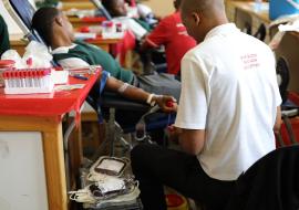 A student donating blood at Nyetane High School 