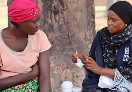 Ladi and a health worker in fufore, LGA during couselling session