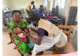 EMTs attending to Measles patients in Moroto