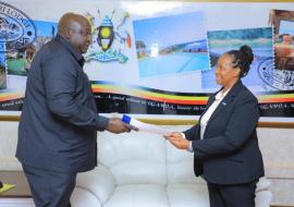 Dr Kasonde Mwinga, the newly appointed WHO Country Representative to Uganda, presenting her credentials to the Minister of State for Foreign Affairs, Hon. Henry Oryem Okello