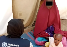 Fatima during a follow-up visit by WHO hard-to-reach medical team.png