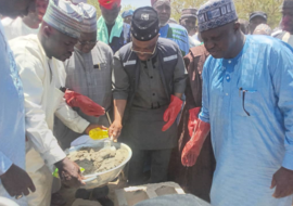 Middle, WR performing the symbolic foundation laying ceremony of the Monguno Specialist Hospital expansion project 