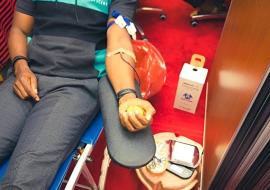 A donor donating blood during the UN blood drive to mark World Blood Donor Day A donor donating blood during the UN blood drive to mark World Blood Donor Day