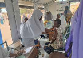 Health services provided at a makeshift health site for the people displaced due to the flood. Photo credit Health services provided at a makeshift health site for the people displaced due to the flood. Photo credit