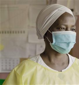A health Health worker wearing face mask on duty _0.jpg